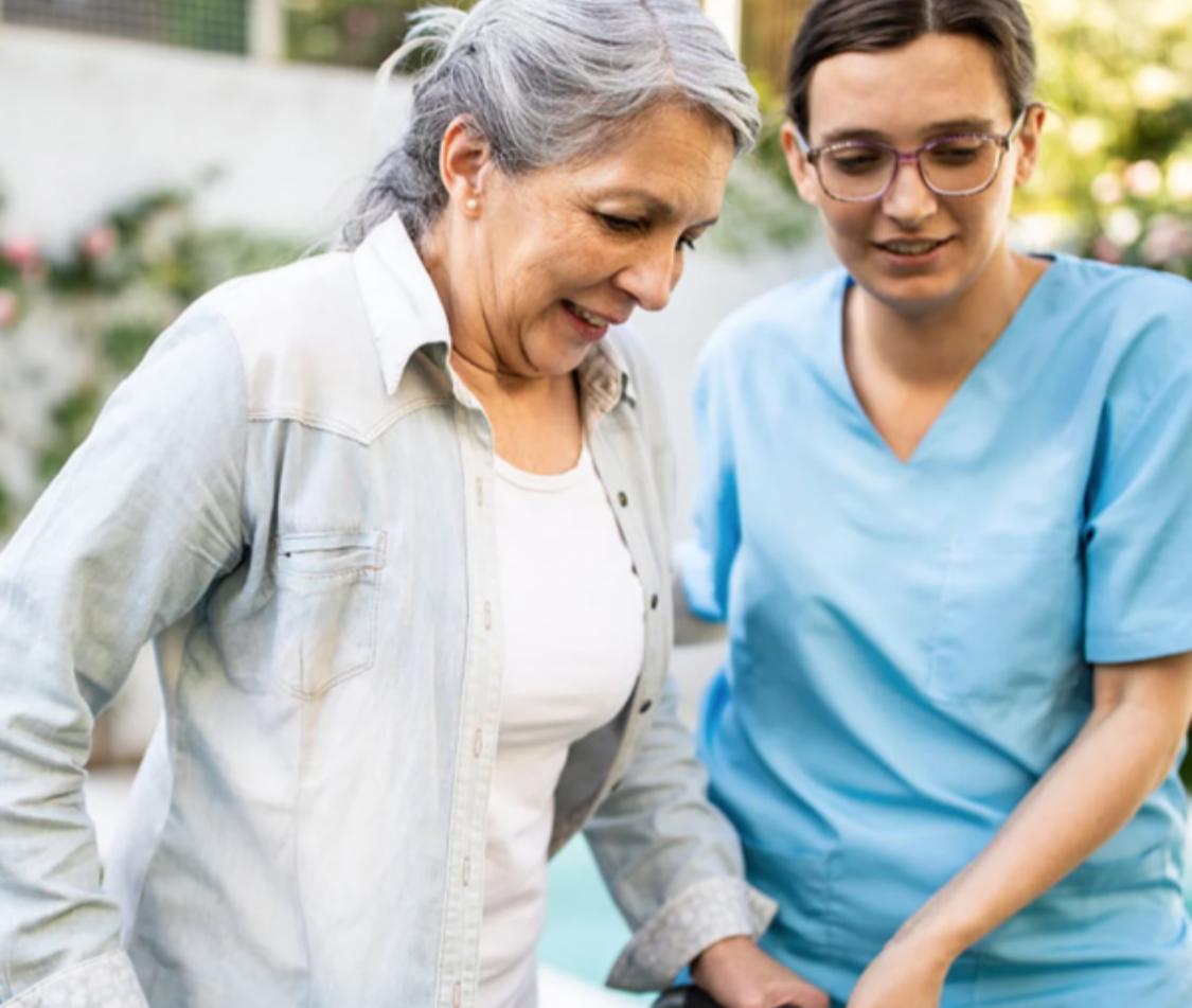 Caregiver supporting senior with daily care needs