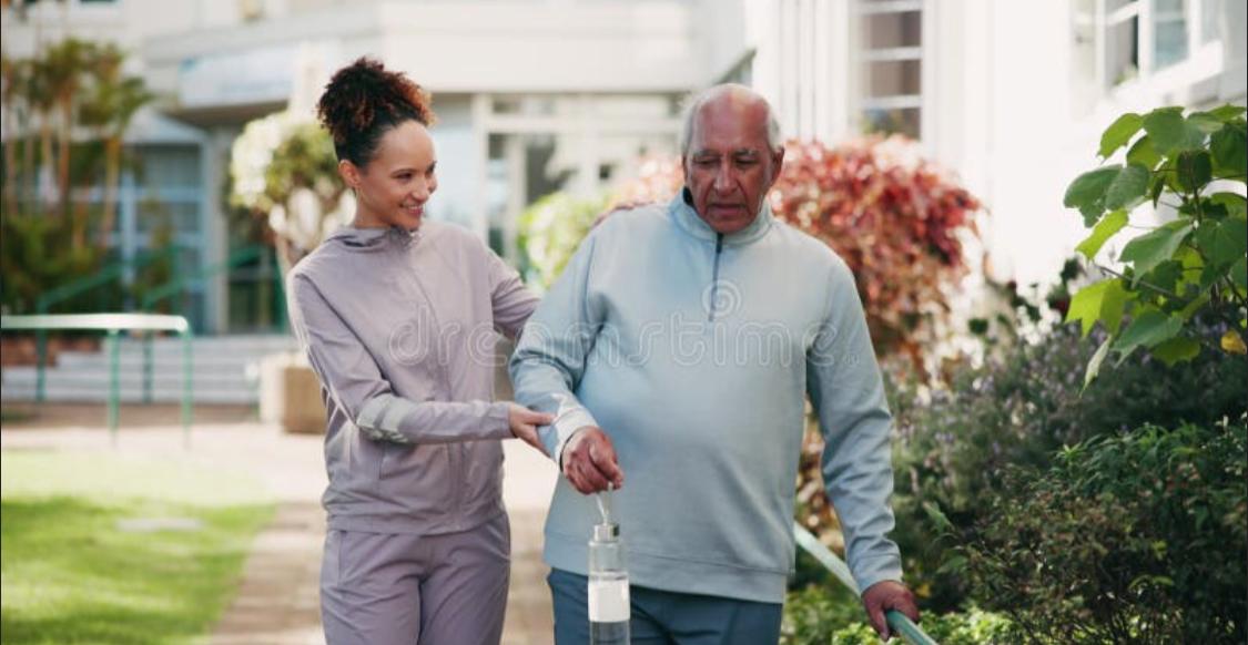 Caregiver providing personalized assistance to senior